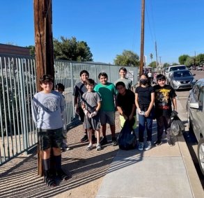 picking up trash at Ocotillo school